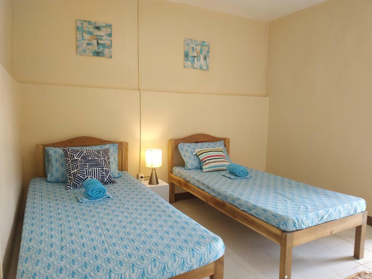 Nelmann'S Nipa Huts Hotell San Vicente  Eksteriør bilde